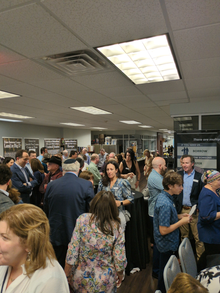 dallas jews zero interest loans Guests look at displays